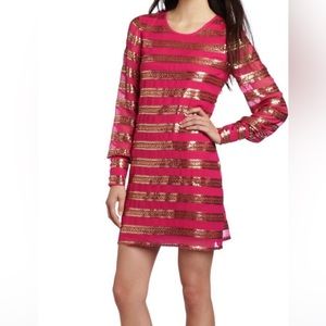 Hot pink with gold sequin stripe.  Long sleeve with pretty cuff detail